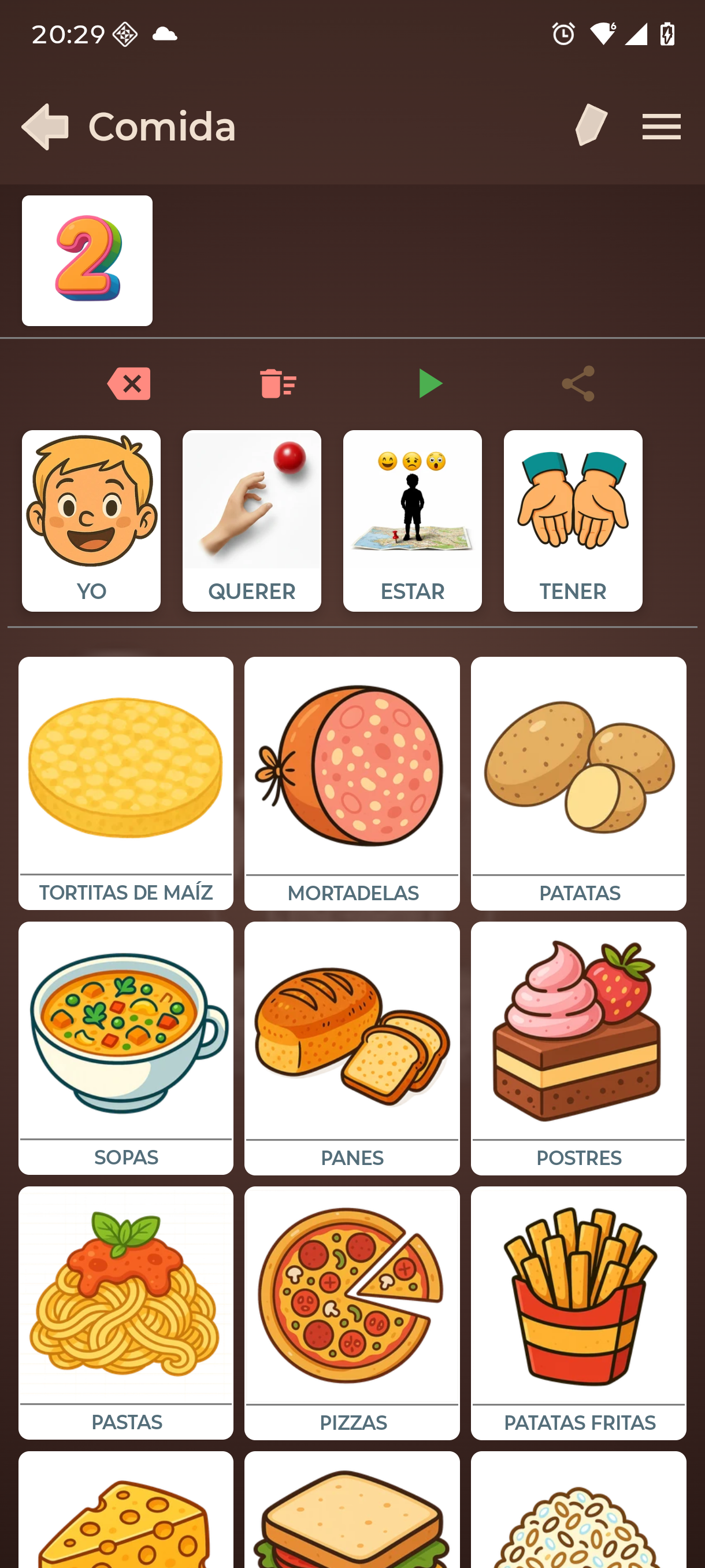 Tablero Comida con «2» en la barra de frase: todos los nombres aparecen en plural — patatas, panes, pizzas, postres…